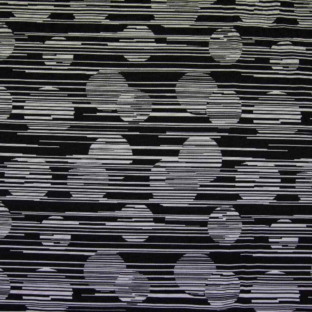 Žakaarmustriga kahepoolne kangas, valged ringid mustal